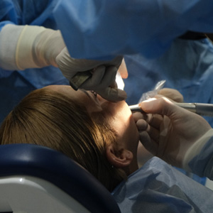 Woman getting oral surgery